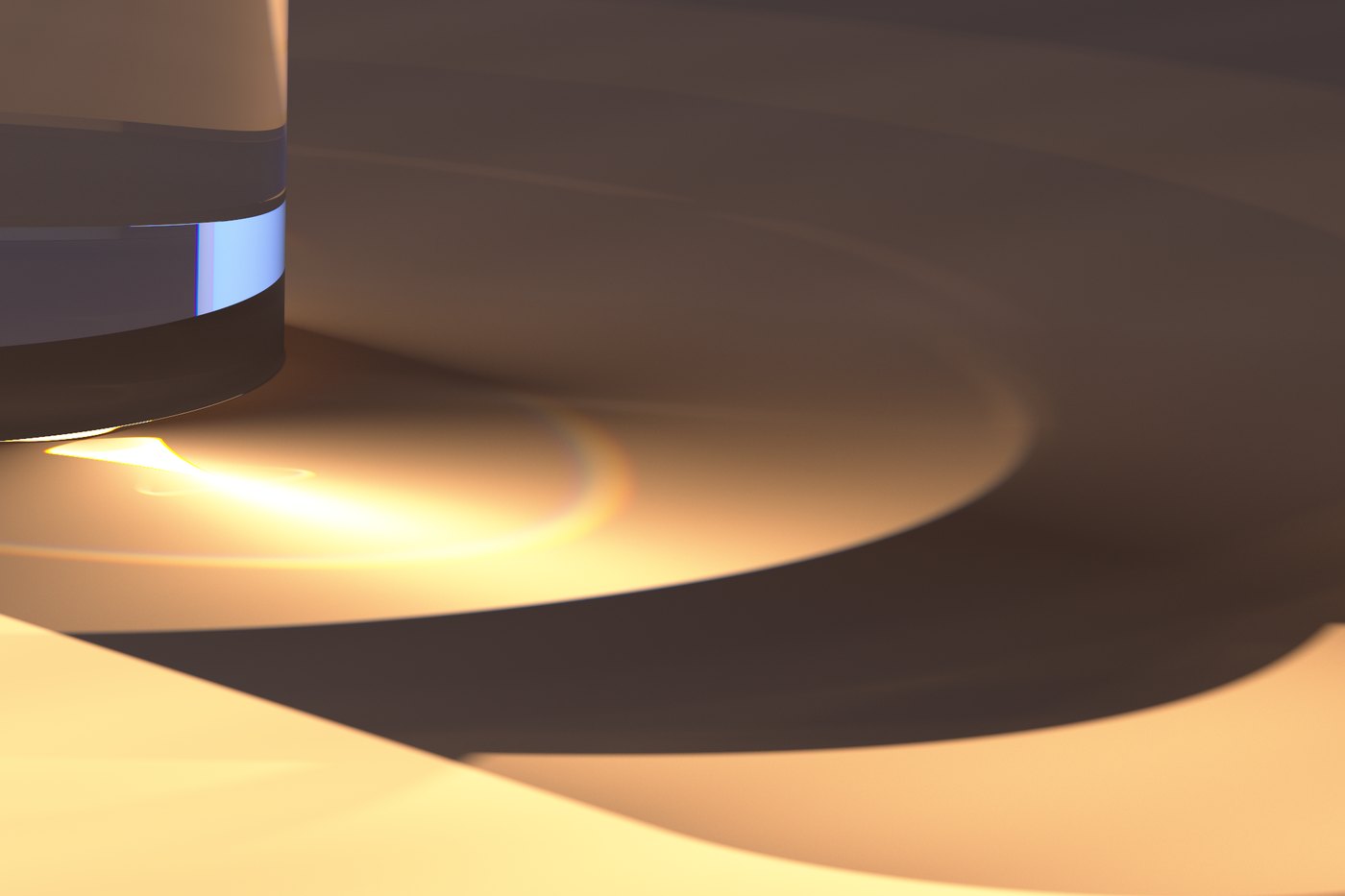 The caustic pooling in the glass's shadow
